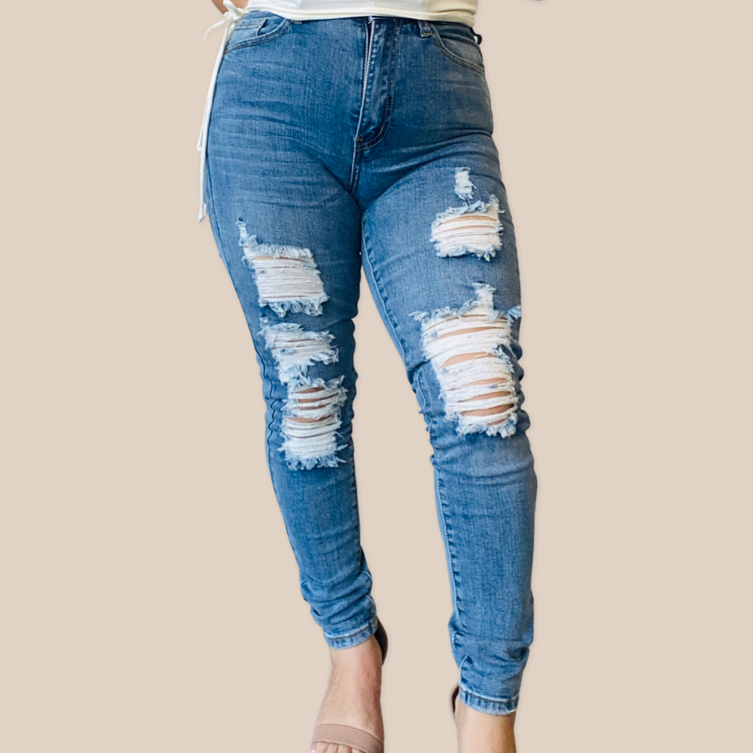 High waisted destroyed jeans